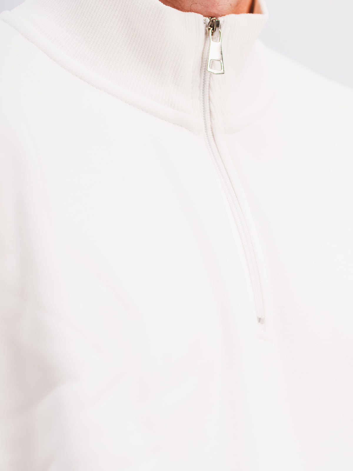 QUARTER ZIP